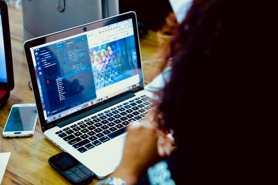developer optimizing code on laptop