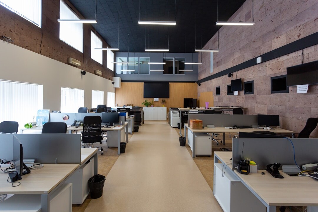 Bright modern office space with desks and large windows